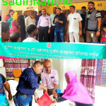 ২০২৬ পবিত্র ঈদ- ঊল ফিতর ঈদ উদযাপন উপলক্ষে, উপকার ভোগীদের মাঝে ১০ কেজি চাউল বিতরণ করেন চেয়ারম্যান মাজহারুল ইসলাম